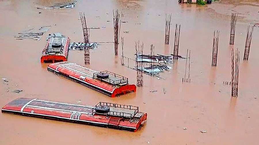 The image of the bus depot under floodwater has gone viral on social media. Credit: PTI Photo