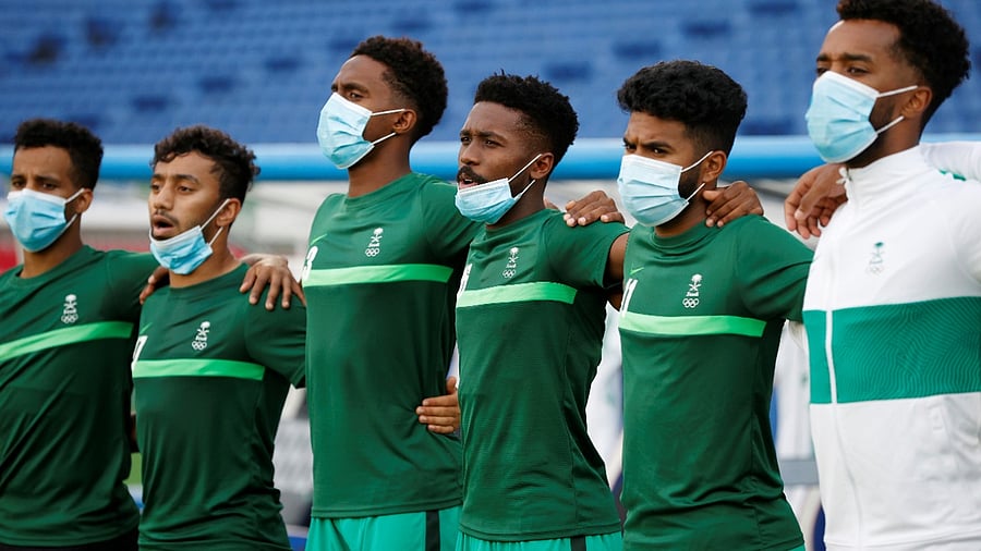 Saudi Arabia players line up for the national anthems before the match. Credit: Reuters Photo