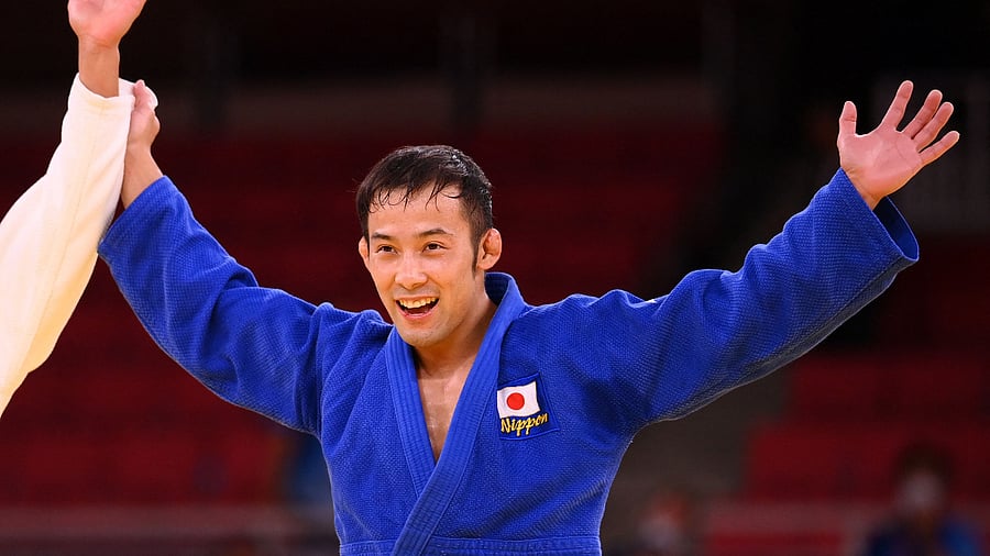 Japan's Naohisa Takato celebrates winning the judo men's -60kg final bout against Taiwan's Yang Yung Wei. Credit: AFP Photo