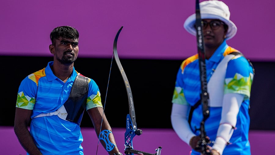  India's Pravin Jadhav and his teammate Deepika Kumari during the mixed team event at the 2020 Olympics. Credit: AP Photo