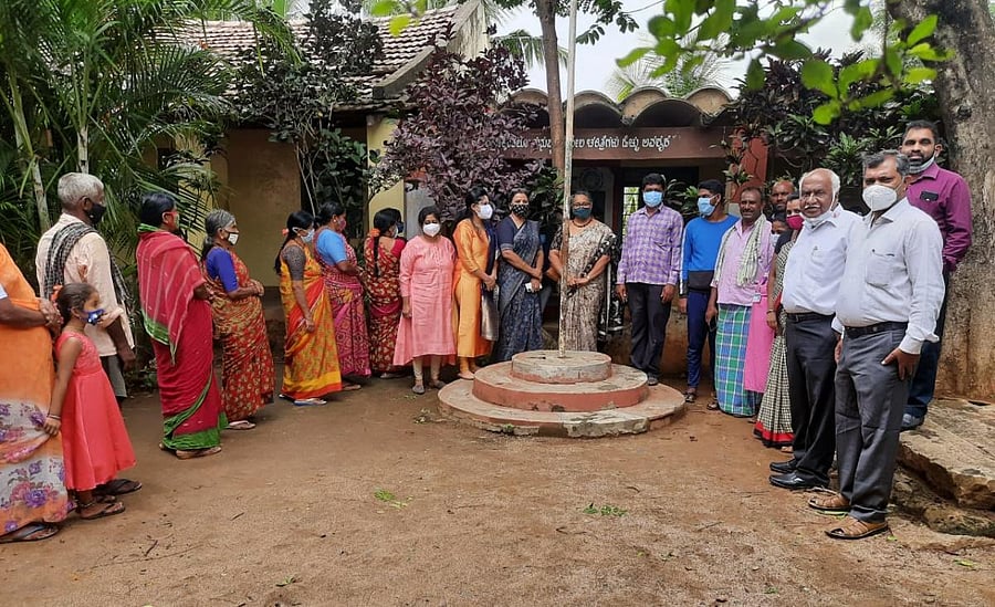 The team of volunteers pose with the villagers outside the health camp. Photos by Dr M P Varsha