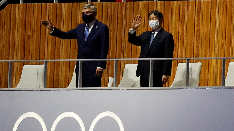 Japan's Emperor Naruhito and Japan's Prime Minister Yoshihide Suga during the Olympics opening ceremony. Credit: Reuters Photo
