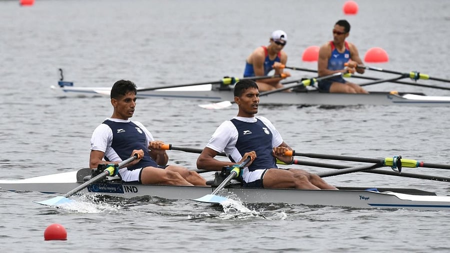 India's Arjun Lal Jat and Arvind Singh (foreground) cross the finish line in the lightweight men's double sculls heat at the 2021 World Rowing Asia-Oceania Olympic and Paralympic Continental Qualifying Regatta in Tokyo on May 6, 2021, where the Olympic and Paralympic Games events will be held. Credit: AFP File Photo