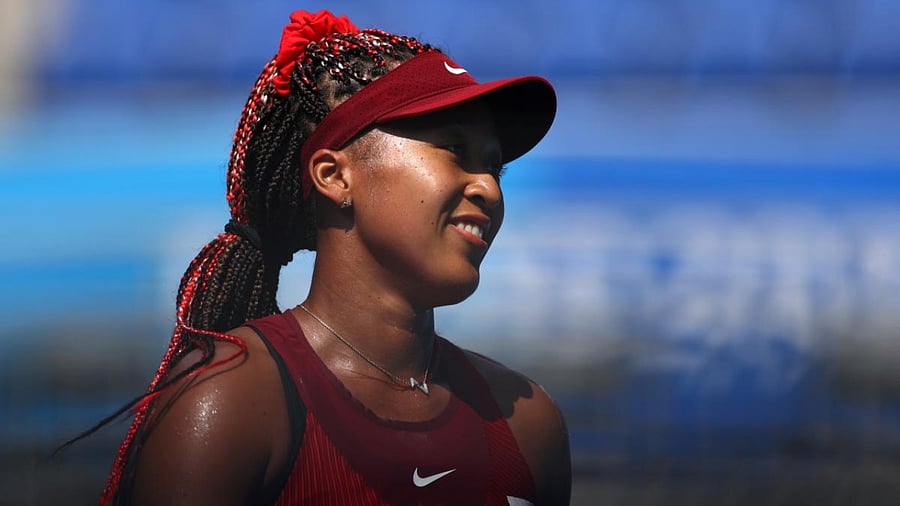 Naomi Osaka of Japan celebrates after winning her first round match against Zheng Saisai of China. Credit: Reuters Photo