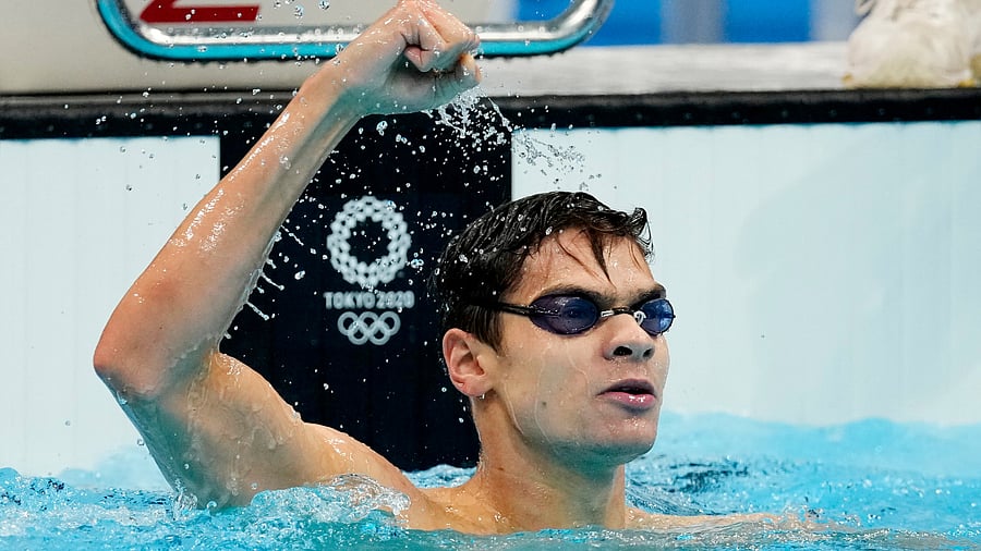 Evgeny Rylov of the Russian Olympic Committee reacts after winning the gold medal. Credit: Reuters Photo