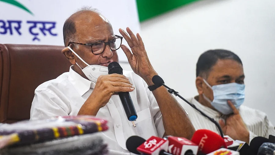 <div class="paragraphs"><p>Nationalist Congress Party chief Sharad Pawar along with Dilip Walse Patil.</p></div>