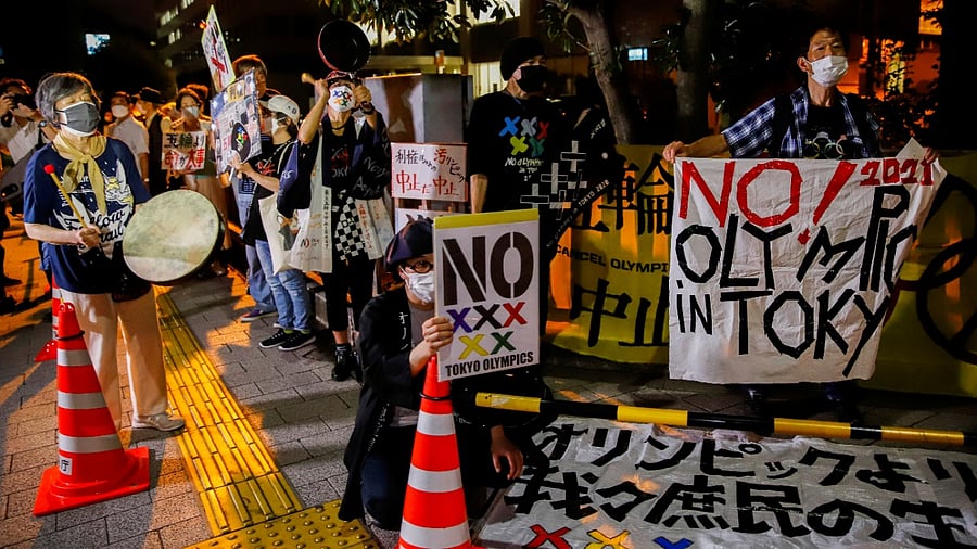 Anti-Olympic protesters flock in front of Japanese Prime Minister Yoshihide Suga's office to call for Tokyo 2020 Olympic Games cancellation. Credit: Reuters Photo