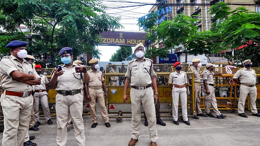 Police outside Mizoram House. Credit: PTI Photo