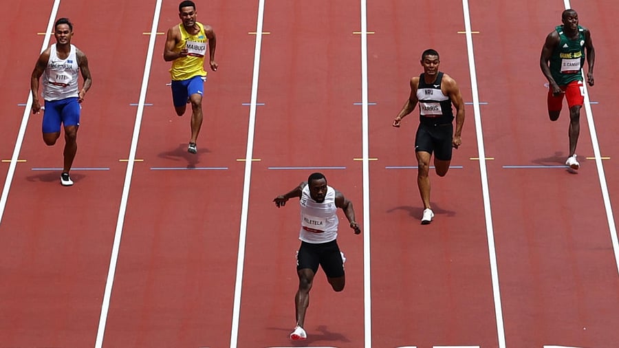 Scott James Fiti of Micronesia, Karalo Maibuca of Tuvalu, Dorian Celeste Keletela of the Refugee Olympic Team, Jonah Harris of Nauru and Seco Camara of Guinea-Bissau in action in Heat 3. Credit: Reuters Photo