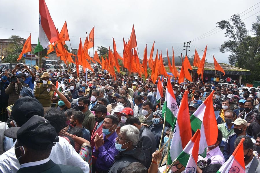 Members of the Ex-servicemen Association and others stage a protest rally in Madikeri.