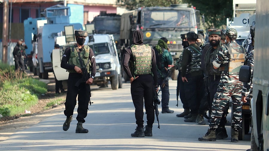 Security forces personnel during a encounter with militants in Warpora area of Sopore in north Kashmir's Baramulla district. Credit: PTI File Photo