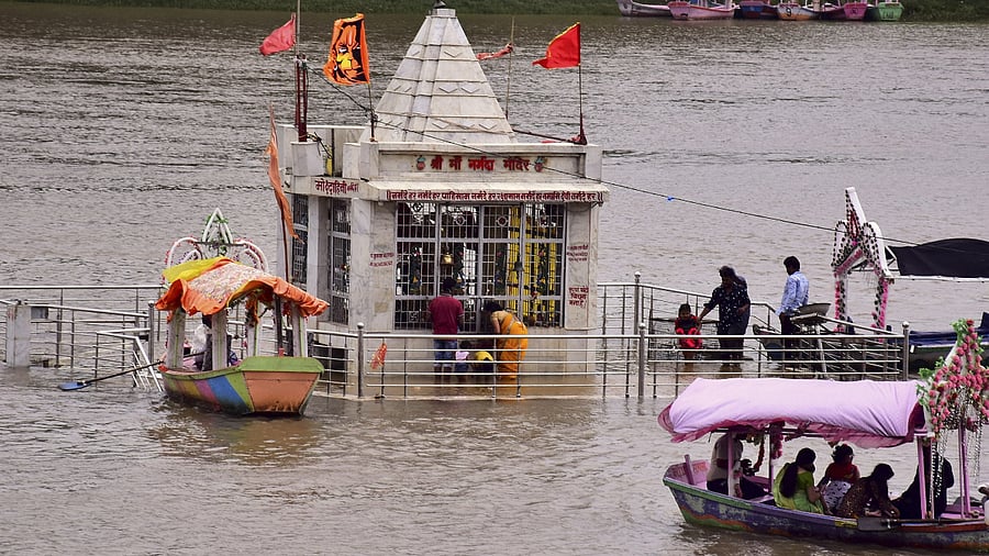 Several areas of Sheopur, located around 400 km from the state capital Bhopal, were inundated after the Parvati river breached its banks following heavy showers. Credit: PTI Photo