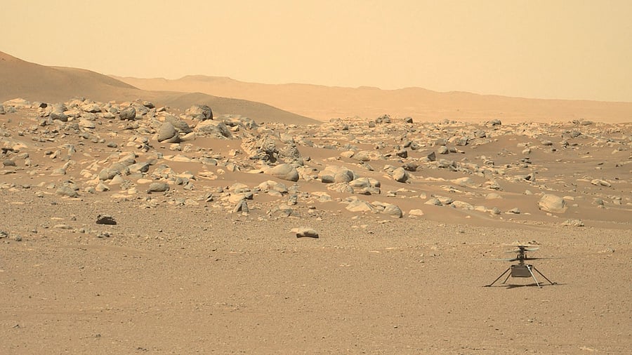 NASA's Ingenuity Mars Helicopter(R) captured by Mars Perseverance rover. Credit: AFP Photo