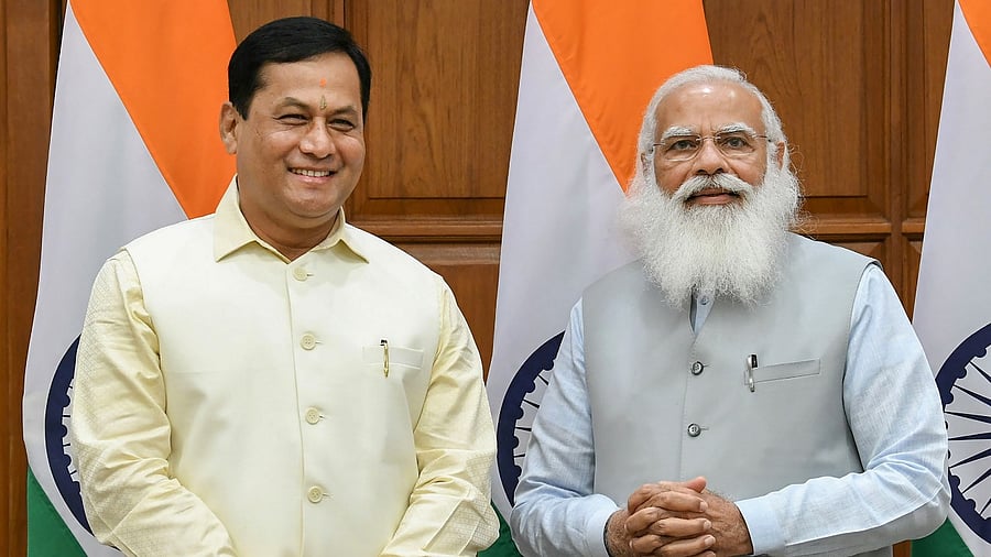 Union minister Sarbananda Sonowal with Prime Minister Modi. Credit: PTI Photo