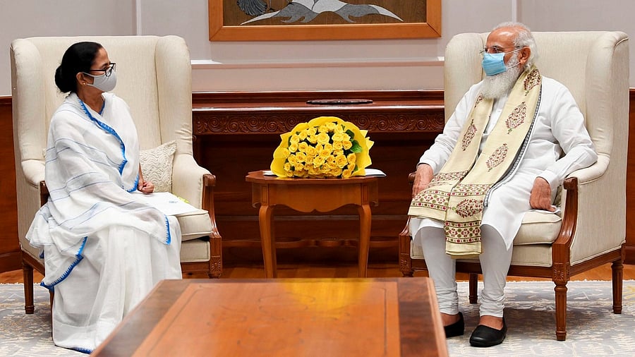 Narendra Modi with West Bengal CM Mamata Banerjee during their meeting in New Delhi. Credit: PTI File Photo