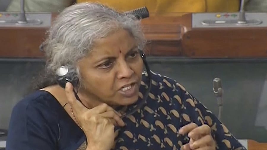  Union Finance Minister Nirmala Sitharaman speaks in the Lok Sabha during the Monsoon Session of Parliament. Credit: PTI Photo