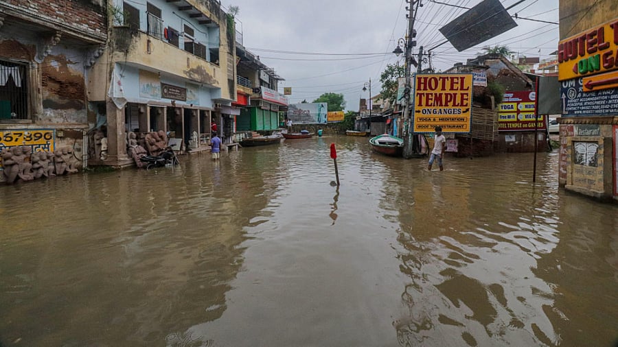 A view of the flooded area at Assi Ghat after the rise in water level of Ganga river in Varanasi. Credit: PTI Photo