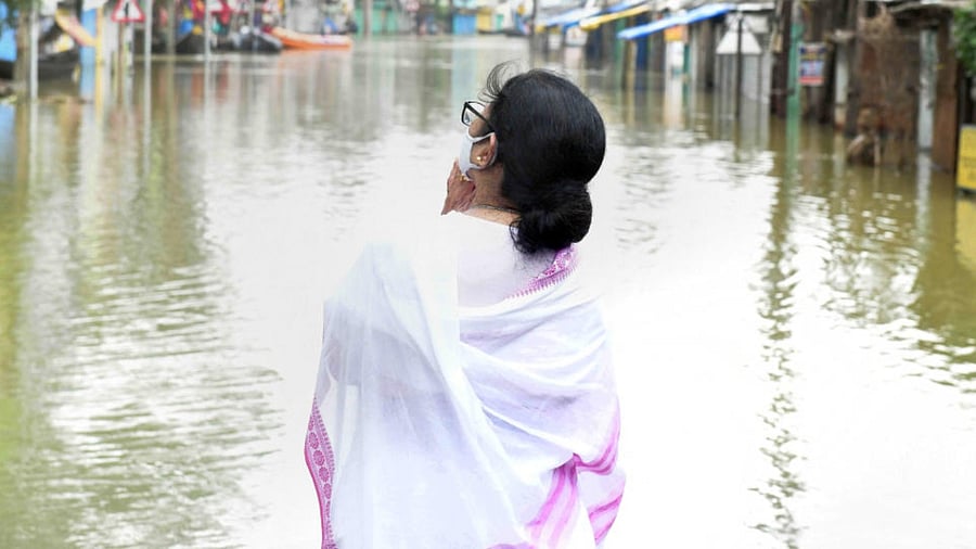 West Bengal Chief Minister Mamata Banerjee during a visit to the flood-affected areas in Ghatal, West Midnapore, Tuesday. Credit: PTI Photo
