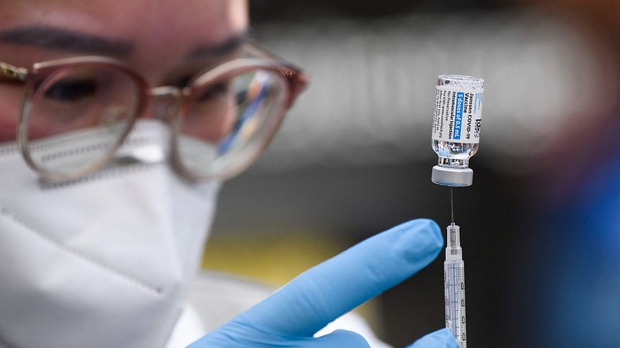 A first dose of the Johnson and Johnson Covid-19 vaccine is prepared at a mobile vaccination clinic in California. Credit: AFP Photo