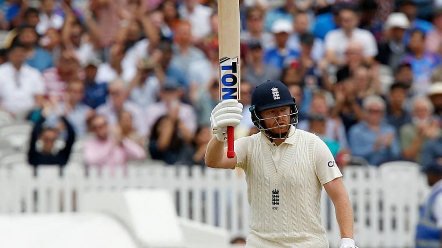England's Jonny Bairstow celebrates his half-century on the third day of the second cricket Test match between England and India at Lord's cricket ground in London. Credit: AFP Photo