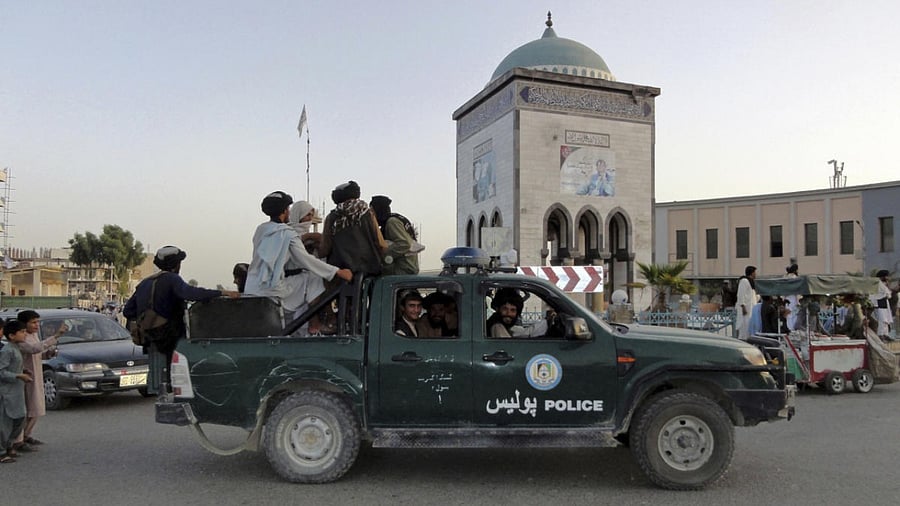 Taliban fighters patrol inside the city of Kandahar, southwest Afghanistan. Credit: AP/PTI Photo