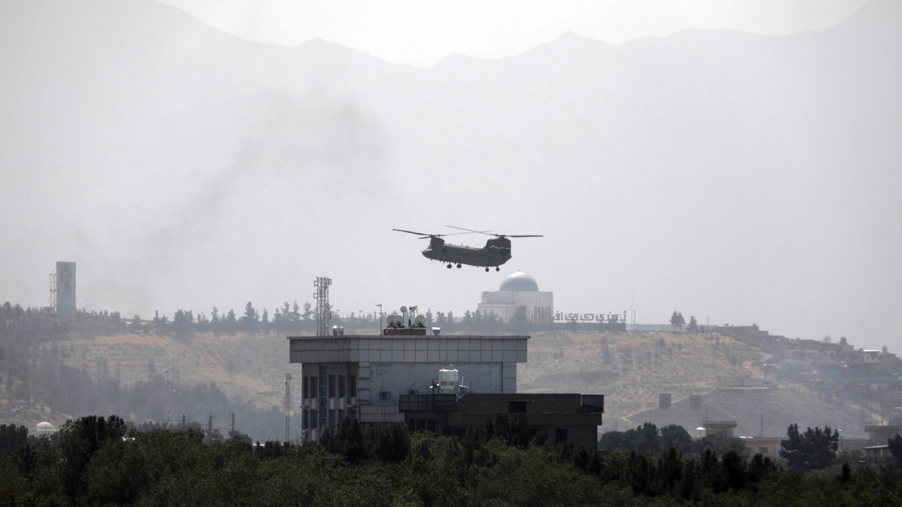 US helicopter flies over the US Embassy in Kabul. Credit: AP Photo