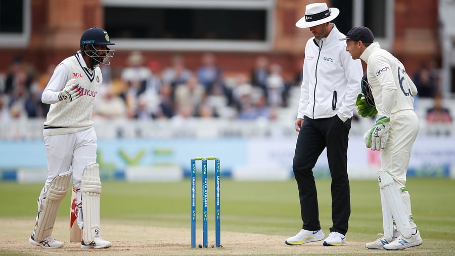 Jasprit Bumrah (L) during a verbal altercation with England wicketkeeper Jos Buttler. Credit: Reuters Photo