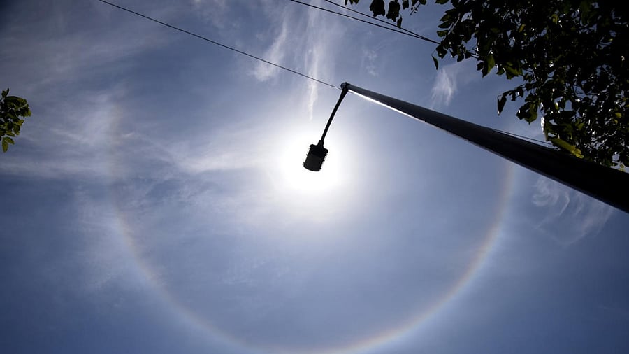 A rainbow-like halo seen around the sun. Credit: DH Photo