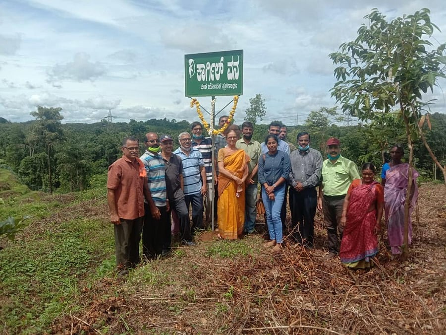 Dignitaries during the symbolic inauguration of Kargil Vana at Mundaje in Belthangady.