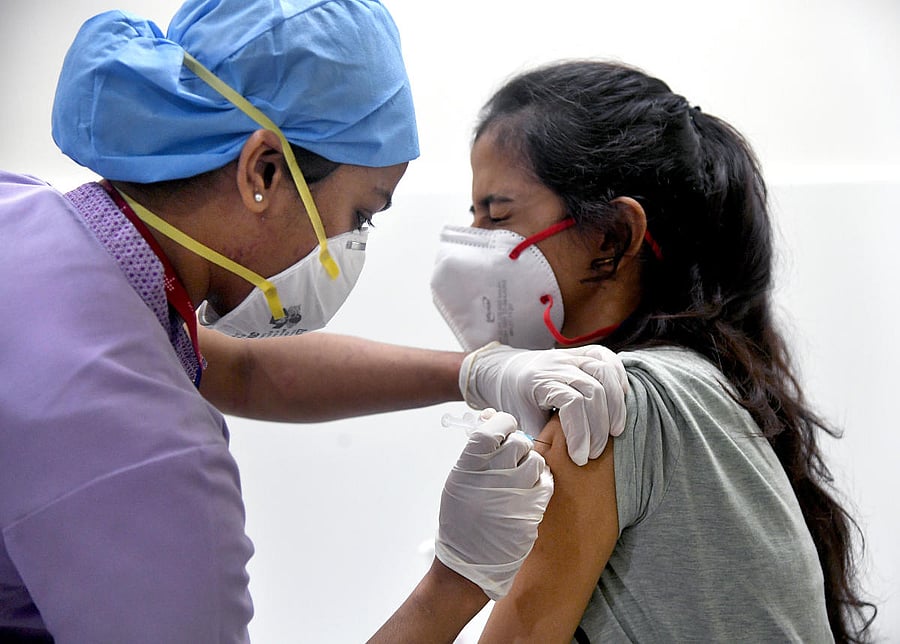 A medical worker receives Covid-19 vaccine at Manipal Hospital. About 1.82 lakh healthcare workers in Bengaluru are getting shots in the first phase of the vaccination drive.