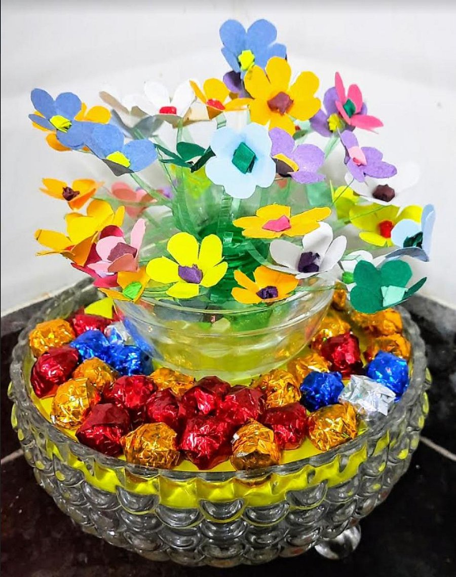 Showpiece made from recycled bottle and waste paper.