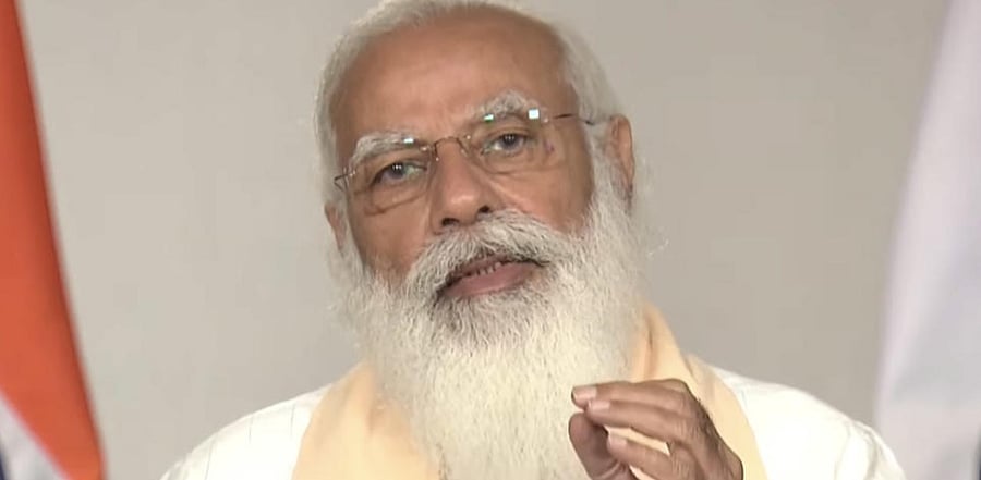 Prime Minister Narendra Modi addresses the nation on the second wave of coronavirus pandemic across the country, via video conferencing, in New Delhi, Tuesday, April 20, 2021. Credit: PTI Photo