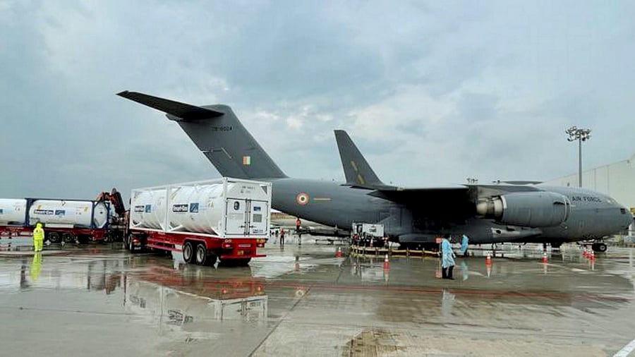 IAF C17 transport aircraft empty oxygen containers from Singapore. Credit: PTI Photo