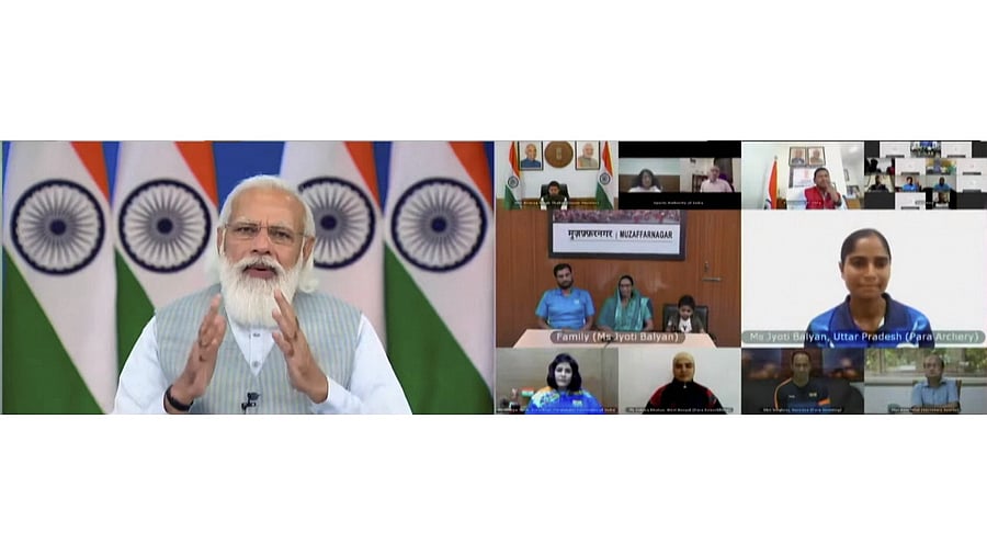 Modi interacts with the Indian contingent for Paralympics. Credit: PTI Photo