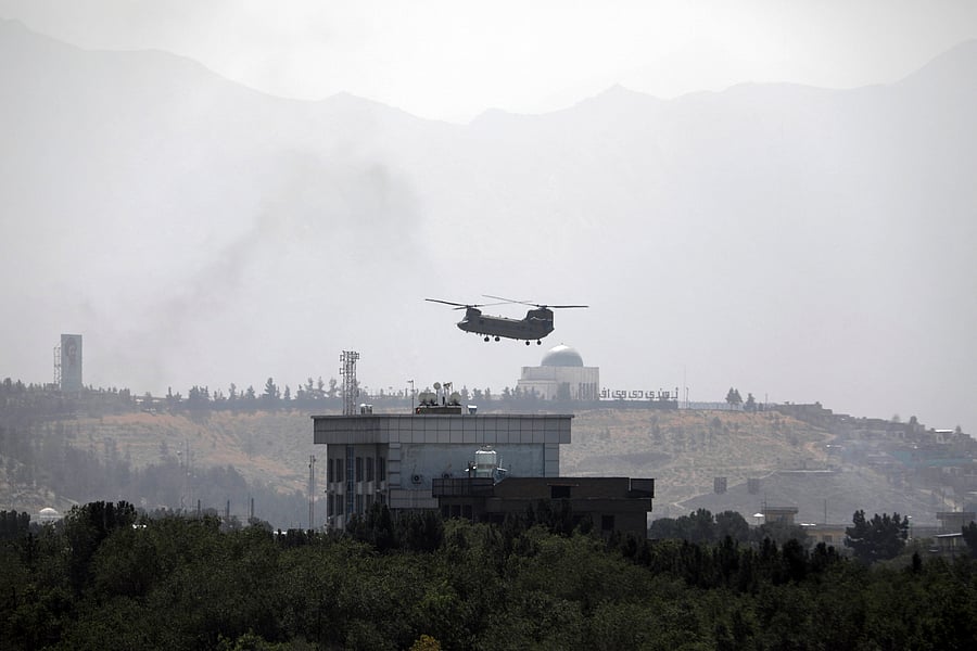 The US military had secured a portion of Hamid Karzai International Airport, just a few kilometers from the center of Kabul, but getting there, and then gaining access to the terminal, became nearly impossible. Credit: AP Photo/ Representative