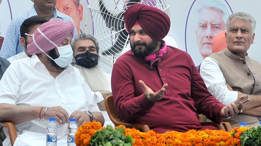Punjab Chief Minister Amarinder Singh and State Congress chief Navjot Singh Sidhu. Credit: PTI Photo