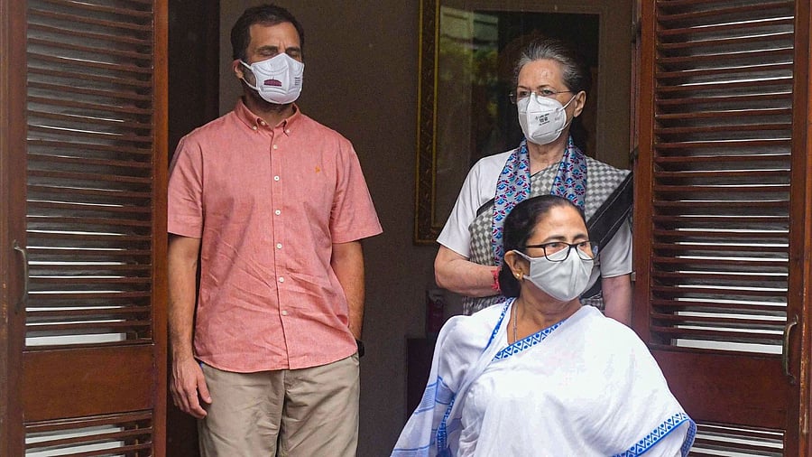 West Bengal CM Mamata Banerjee leaves after meeting Congress Interim President Sonia Gandhi in New Delhi. Congress leader Rahul Gandhi is also seen. Credit: PTI File Photo