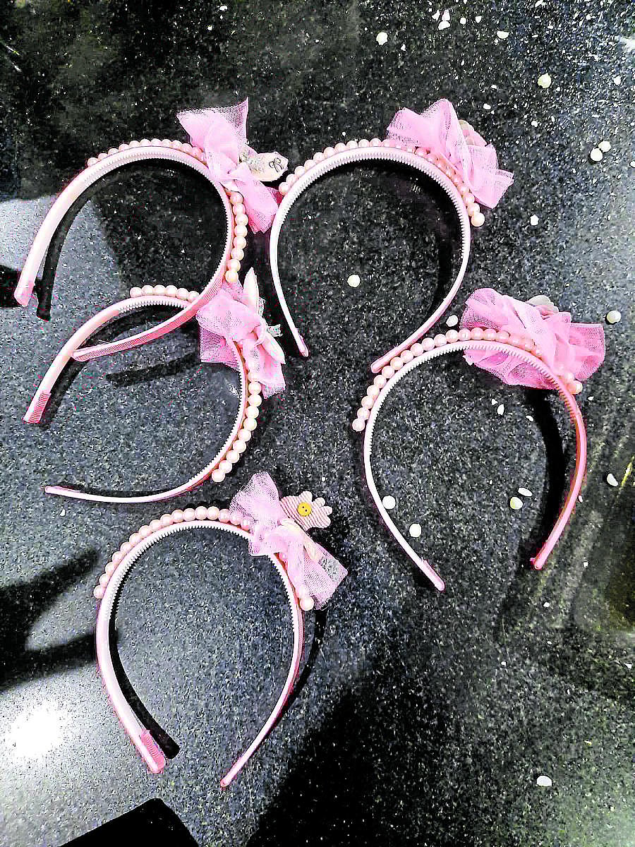 Gold was found concealed inside the beads of hair bands.