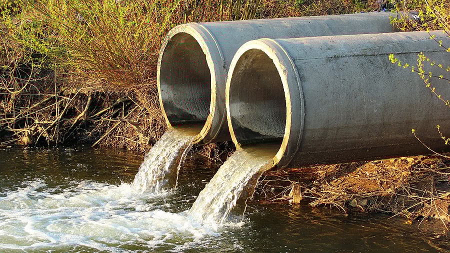 Puttur Tahsildar Ramesh Babu had complained that wastewater was discharged into the river and soak pits were constructed illegally on government land by the accused. Representative image. Credit: iStock photo