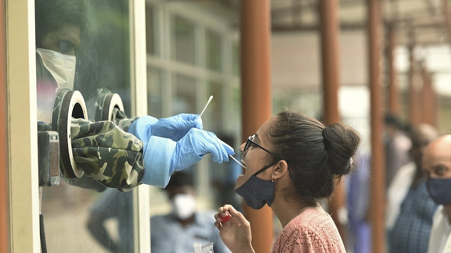 Among the districts where the new cases were reported, Bengaluru Urban accounted for 295. Credit: PTI Photo