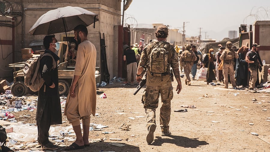 Tens of thousands of Afghans fearing persecution have thronged Kabul's airport since the takeover. Credit: Reuters Photo
