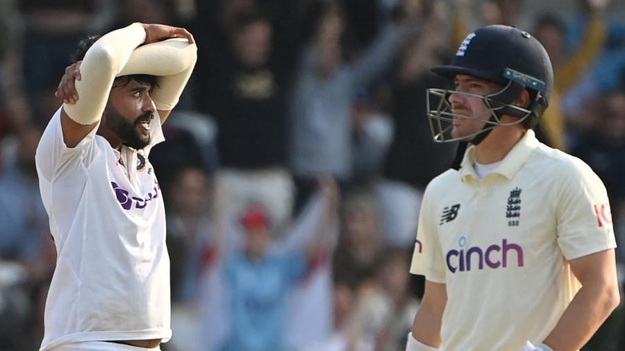 India's Mohammed Siraj (L) and England's Rory Burns (R) on the first day of the third cricket Test match between England and India at Headingley cricket ground in Leeds, northern England, on August 25, 2021. Credit: AFP Photo