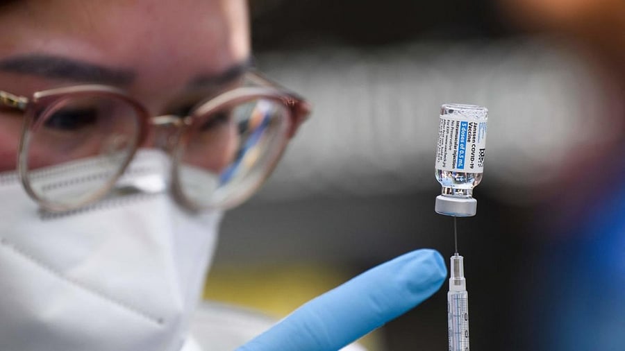 A healthcare worker prepares Covid-19 vaccine. Credit: AFP Photo