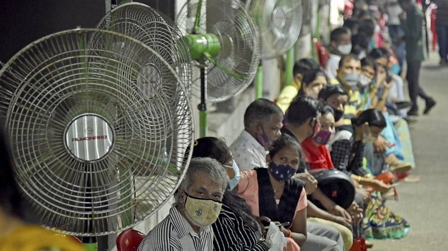 People wait to get vaccine against coronavirus in Navi Mumbai. Credit: PTI Photo