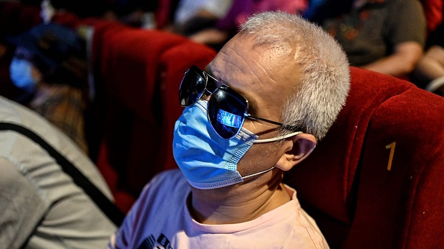 Zhang lost his sight in his early twenties due to a degenerative condition. Credit: AFP Photo