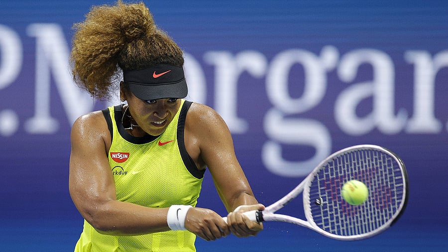 Naomi Osaka of Japan returns a shot against Marie Bouzkova of Czech Republic during their women's singles first round match on Day One of the 2021 US Open. Credit: AFP Photo