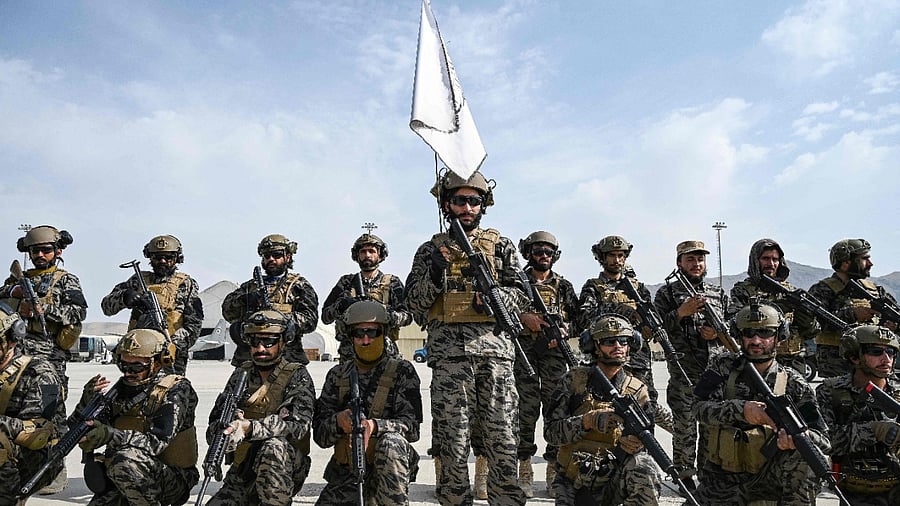 Members of the Taliban Badri 313 military unit take a position at the airport in Kabul. Credit: AFP Photo