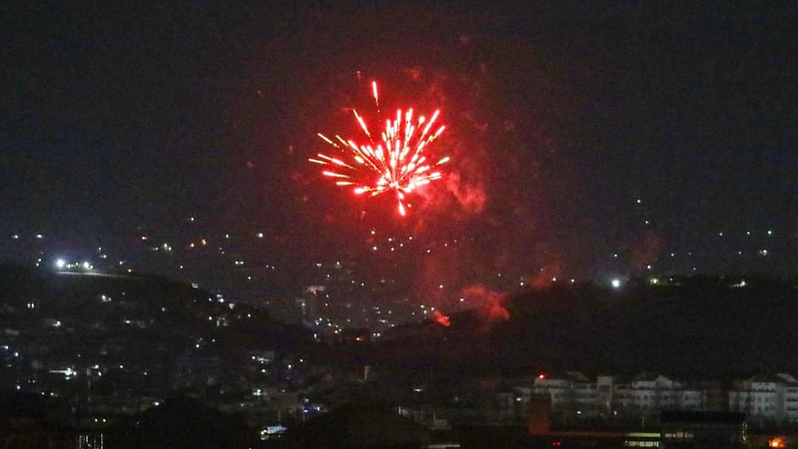 Celebratory gunfires light up part of the night sky after the last US aircraft took off from the airport in Kabul early on August 31, 2021. Credit: AFP Photo