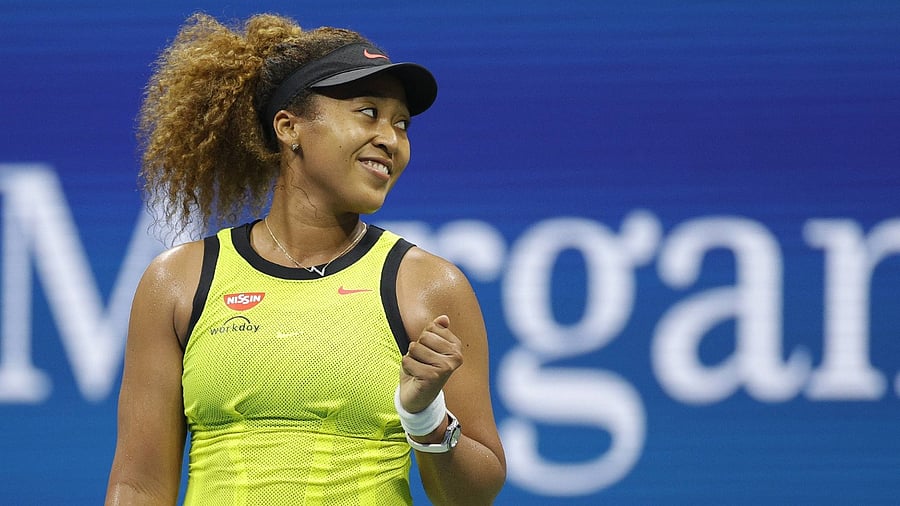 Naomi Osaka of Japan celebrates against Marie Bouzkova (not pictured) of the Czech Republic during their Women's Singles first round match on Day One of the 2021 US Open at the Billie Jean King National Tennis Center on August 30, 2021 in the Flushing neighborhood of the Queens borough of New York City. Credit: AFP Photo