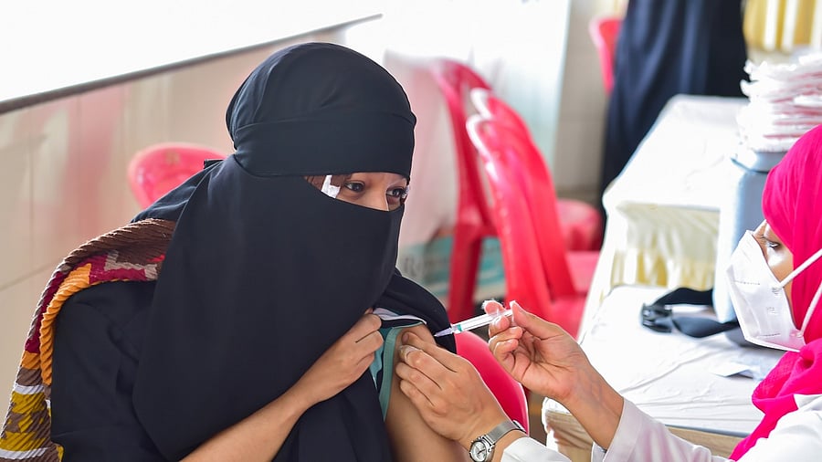 A beneficiary receives a dose of Covid-19 vaccine. Credit: PTI Photo